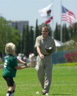 Sara gets some batting practice with Haley's dad