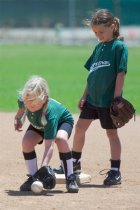 Sara and Danielle practice fielding