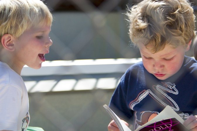 Timothy reads to Adam