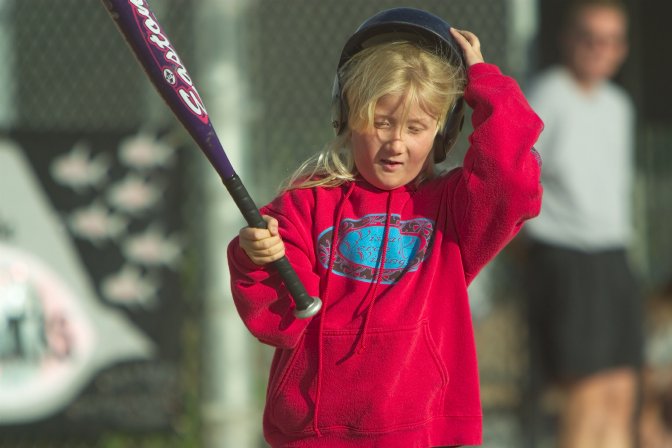 Sara adjusts her helmet