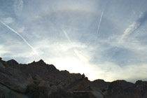 Sunset Rainbow with Silhouetted Figure