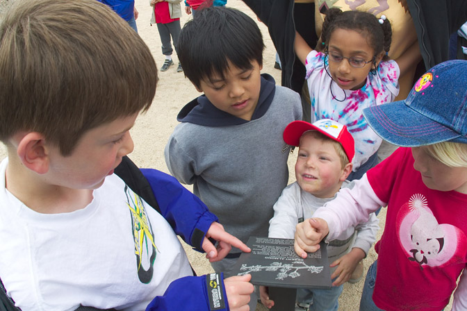 Timothy gets some help reading the signs