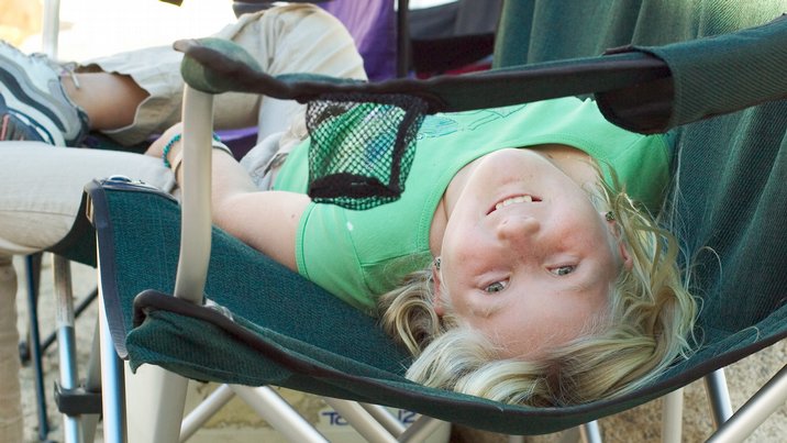 Sara relaxes in a camp chair