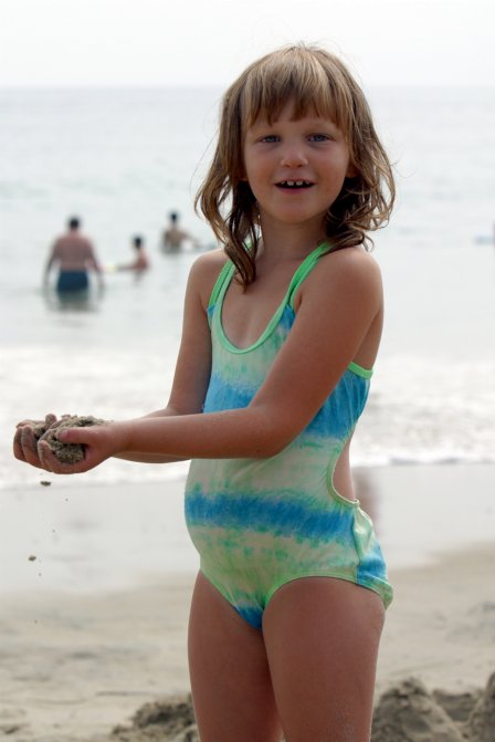 Leah Holding some Sand