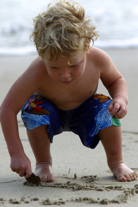 Timothy Drawing in the Sand