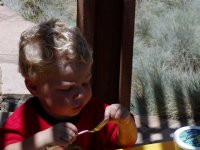 Timothy holding a spoon