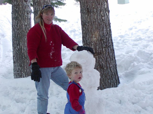 Diana and Timothy make a snowman