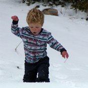 Timothy discovering that snow is cold