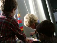 Boys playing in the window
