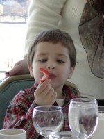 Tommy with a strawberry