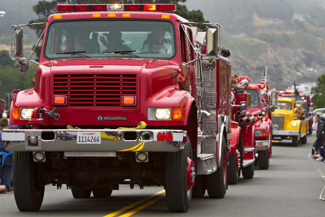 Fire trucks lead off the parade