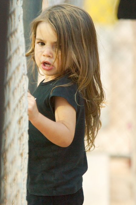Lily Climbing The Backstop