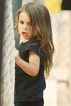 Lily Climbing The Backstop