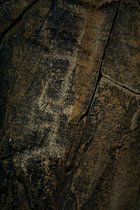 Petroglyph And Rock Cracks