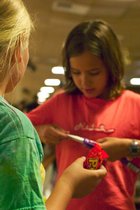 Lee and Sophia trade candy