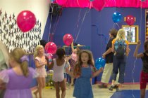 Handing out balloons