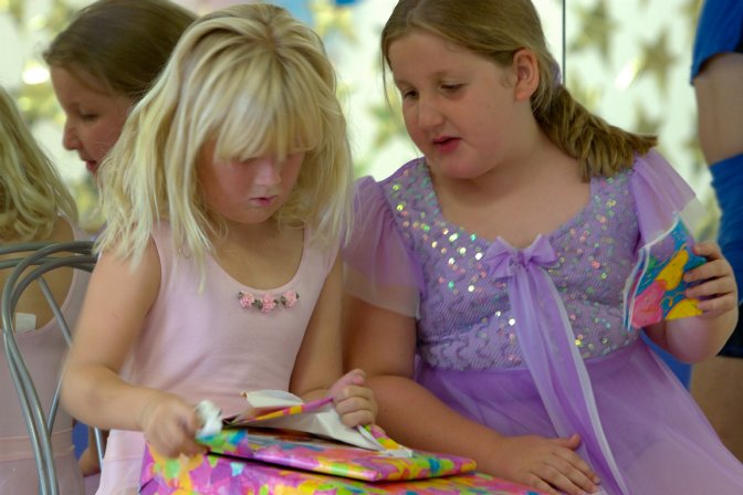 Sara opening Rachel's present