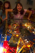 Caitlin playing pinball