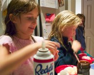 Caitlin and Sara make sundaes