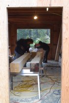 Shaping porch pillars in the workshop