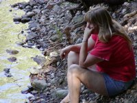 Diana sits by the river side