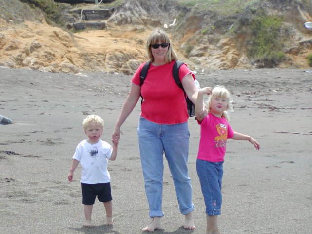 Family walking on the beach