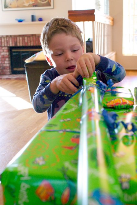 Timothy opening his presents