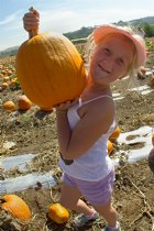 Sara with a pumpkin
