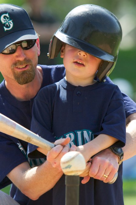 Timothy gets some help with his swing