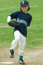 Alana goes into her windup...at first base