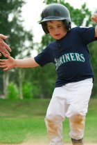 Noah heads for a slide as he comes home