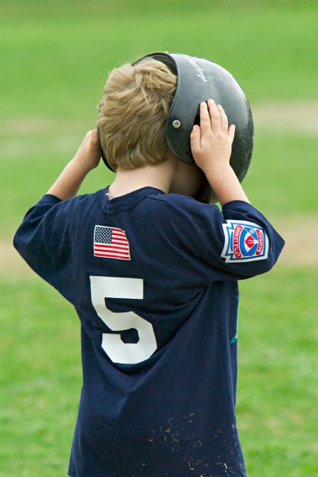 Timothy puts his helmet on