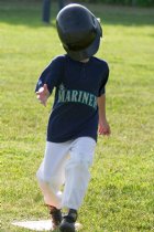 Alana has a helmet problem as she comes into second