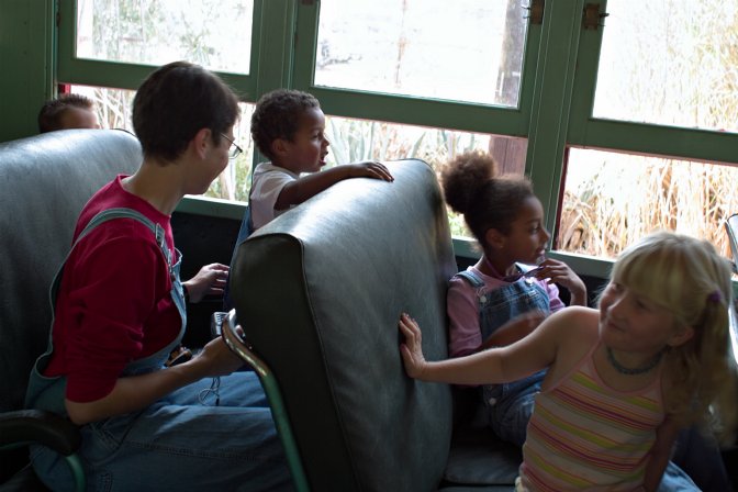 Beth, Miles, Walden, and Sara riding on Thomas