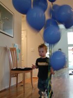 Drake playing with balloons