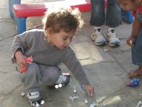 Reuben collecting piñata candy
