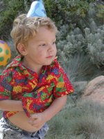 Timothy in a party hat