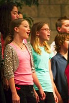 Kiley and the fifth graders sing Pack She Back To She Ma