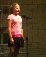 Nicole singing Popular