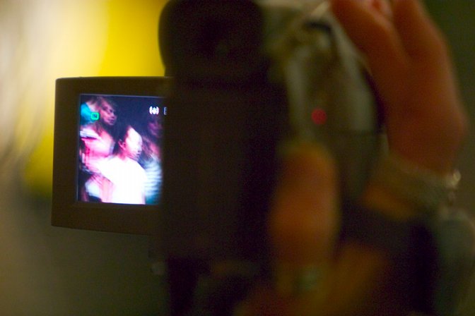 A parent videotaping the show