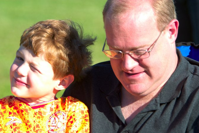 Max at halftime with his father