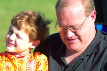 Max at halftime with his father