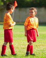 Zion and Hayden chat at midfield